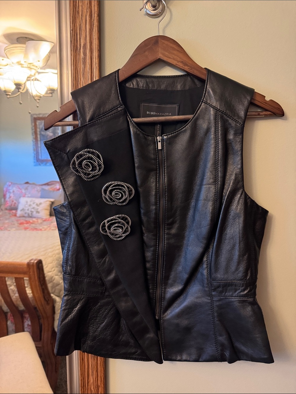BCBGMaxAzria Black Leather Sleeveless Zip-Front Vest with Rosette Detail